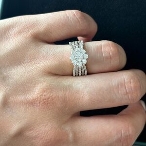 14K solid gold cubic zircon floral ring. It is a gift. Size 8-9